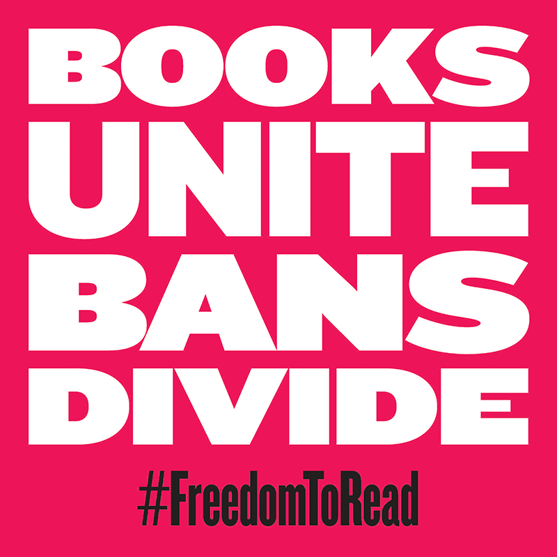 Pink placard that reads "BOOKS UNITE BANS DIVIDE #FreedomToRead"