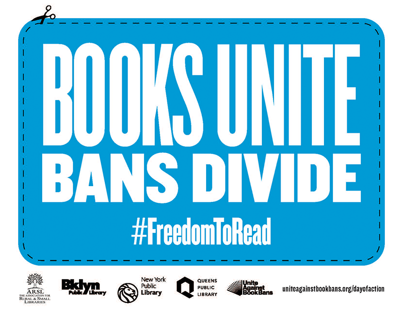 Photo prop that reads "BOOKS UNITE BANS DIVIDE #FreedomToRead"