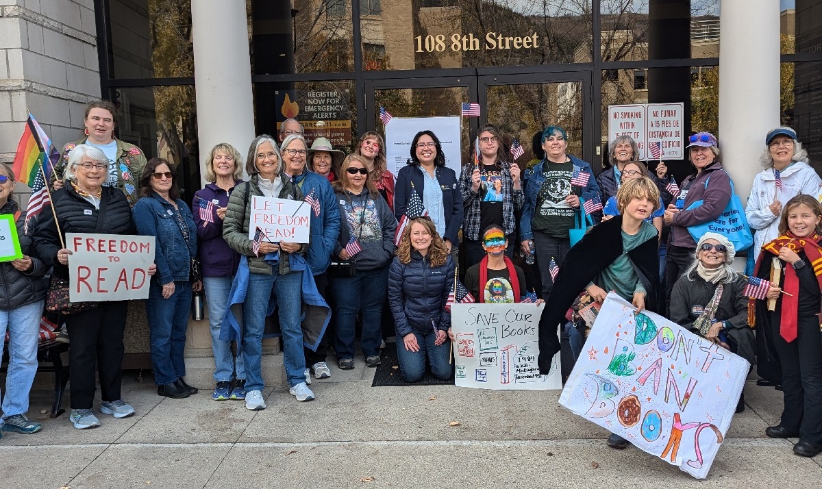 Supporters of the Garfield County Public Library District (CO) stand in front of the county administration building.